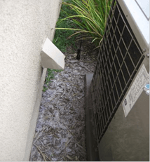 Part 2 of 2 figures- showing a noncompliant condensing unit clearance from a dryer vent at a different angle Part 2 of 2 figures- showing a noncompliant condensing unit clearance from a dryer vent at a different angle
