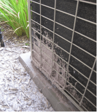 Part 1 of 2 figures- Figure 1 showing noncompliant condensing unit clearance from a dryer vent Part 1 of 2 figures- Figure 1 showing noncompliant condensing unit clearance from a dryer vent