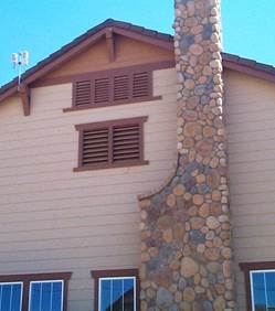 Figure showing a sample gable end air intake with a lower set of vents